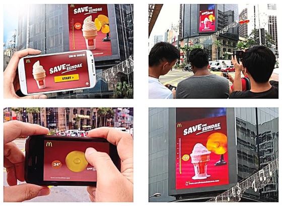 Billboard digital McDonald’s di Bukit Bintang, Kuala Lumpur, Malaysia. Sumber: Pubnub (Klik untuk lihat video)